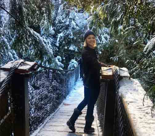 Amanda Pacheco taking a picture.